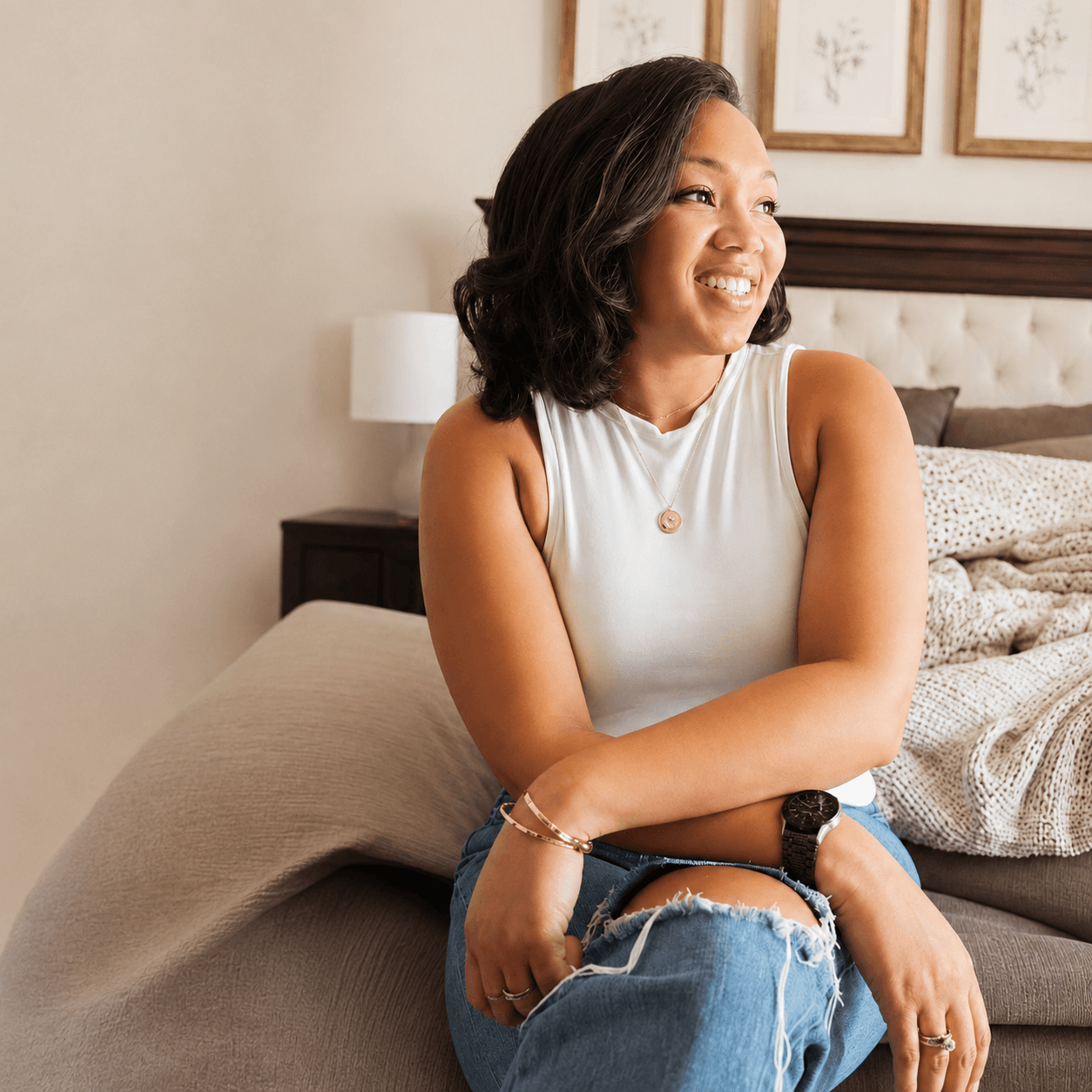 Alexis, the founder of Place & Plenty, smiling at home.